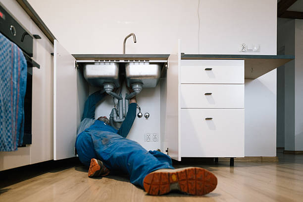 Professional Emergency Plumber technician working in Rutherford, NJ